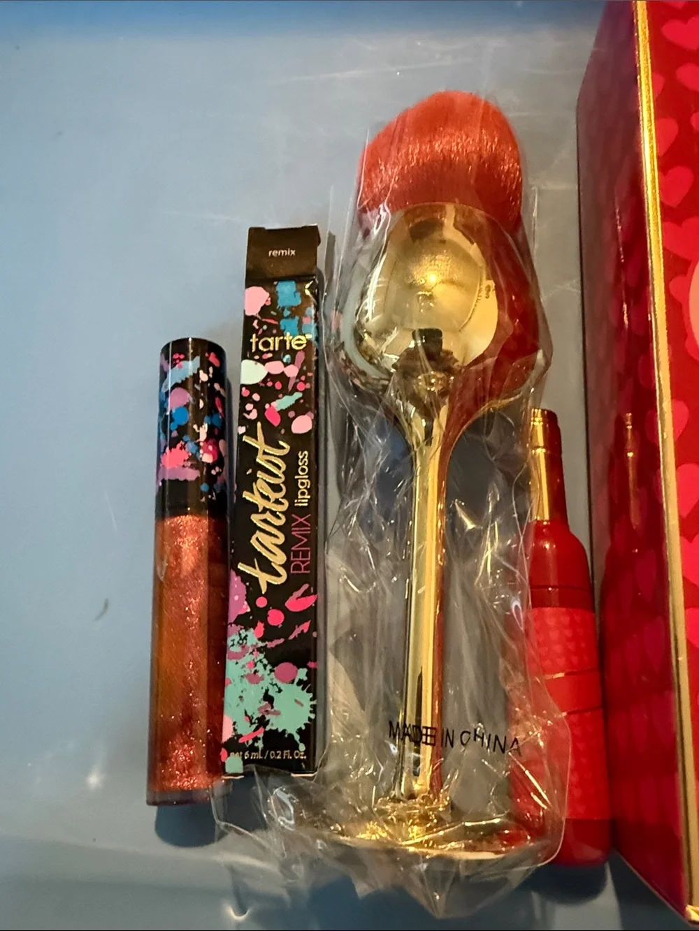 tarte Remix Shimmer Lipgloss in Bronze-Copper with Gold Brush